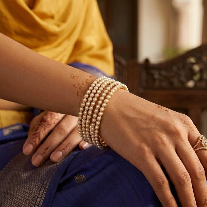 Elegant Multi-Row Pearl Gold Plated Bangle Set for Women | Premium Wedding & Festive Wear