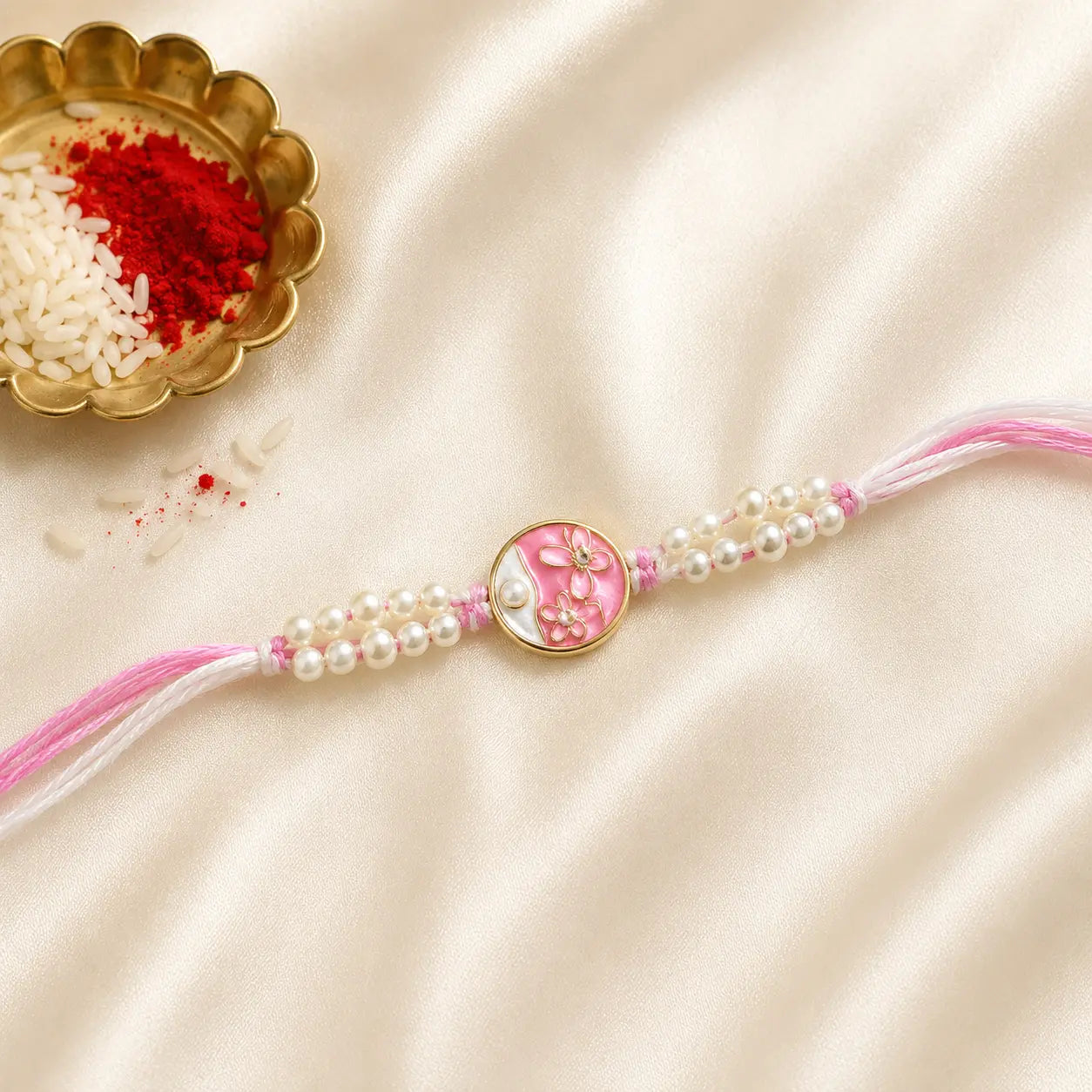 Pink Floral Pearl Designer Rakhi with Enamel Flower Centrepiece and Pearl Bead Detailing, Handmade Raksha Bandhan Rakhi by Kashika JewelCrafts