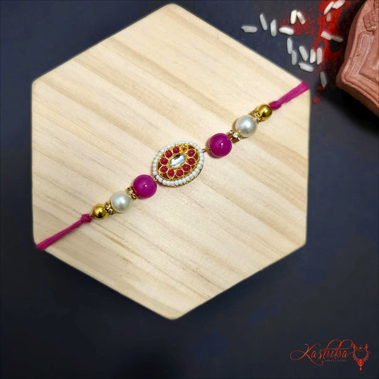 Traditional Oval Kundan Rakhi with Pink & Pearl Beads