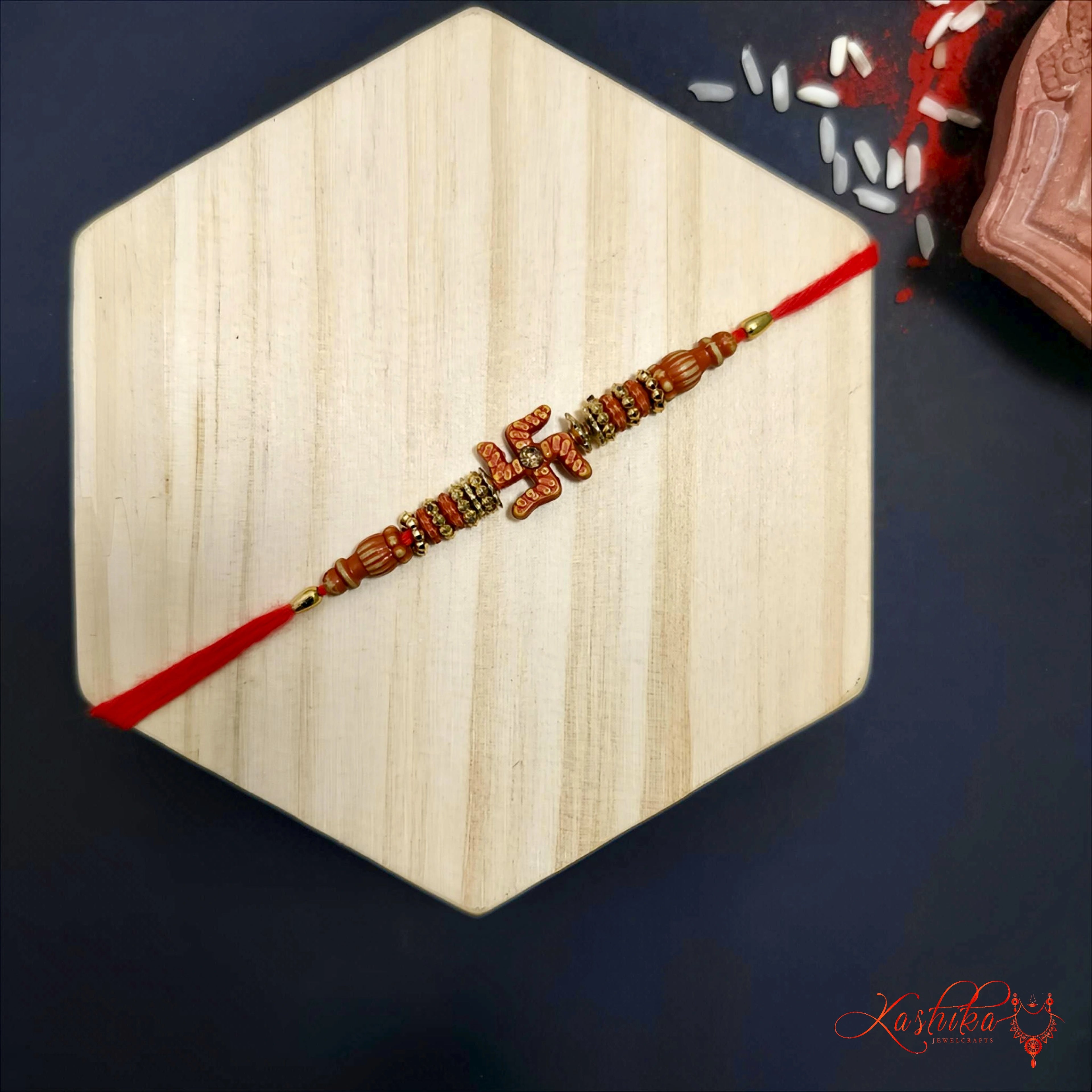 Traditional Swastik Rakhi with Beaded Detailing product image by Kashika JewelCrafts