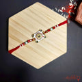 Meenakari Floral Rakhi with Beaded Thread product image by Kashika JewelCrafts