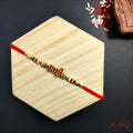 Bhai Letter Rakhi with Multicolor Beads product image by Kashika JewelCrafts