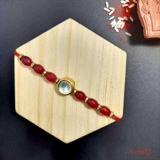 Elegant Dark Red Beaded Rakhi with kundan detailing
