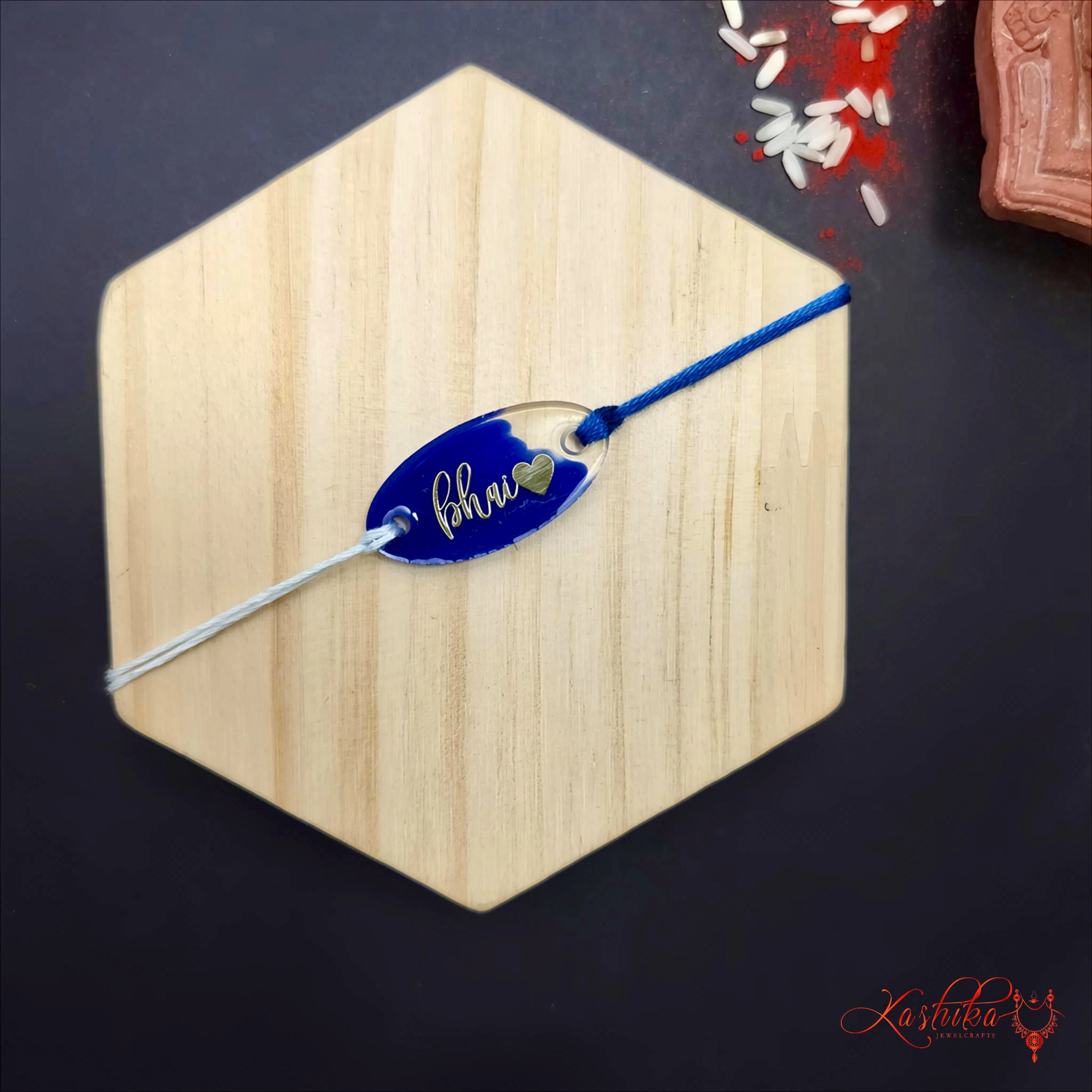 Modern "Bhai" Engraved Resin Rakhi - Stylish Rakshabhandan Thread for Brother product image by Kashika JewelCrafts