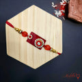 Dark Red Floral Designer Rakhi - Elegant Raksha Bandhan Thread product image by Kashika JewelCrafts