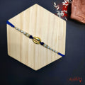 Golden Shell Evil Eye Rakhi - Unique & Protective Raksha Bandhan product image by Kashika JewelCrafts