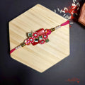 Elegant Red Stone Rakhi for Brother - Raksha Bandhan product image by Kashika JewelCrafts