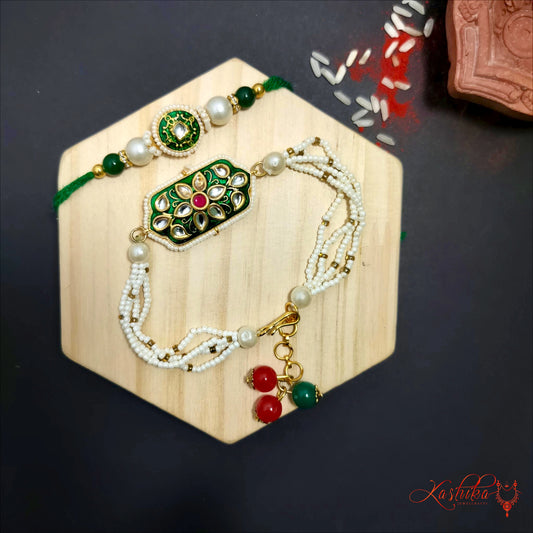 Kundan Couple Rakhi set wit re-wearable pearl bracelet for female and traditional rakhi for brother , featuring green and red kundan stone work