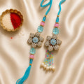 Pastel Floral Crystal Bhai Bhabhi Rakhi Set with Multicolour Bead Tassel by Kashika JewelCrafts
