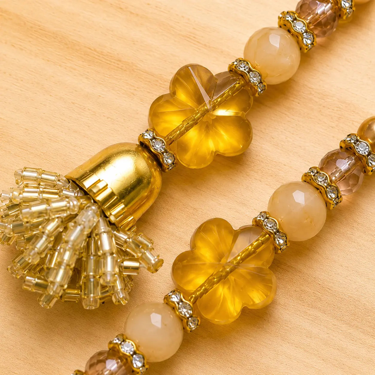 Handcrafted Amber Bhai Bhabhi Rakhi Set with Designer Lumba, Crystal Beads & Gold Floral Accents for Raksha Bandha