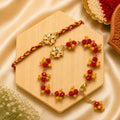 Handmade Red & Yellow Floral Bhai Bhabhi Rakhi Set with crystal bead bracelet and designer Lumba Rakhi by Kashika JewelCrafts.