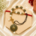 Handmade Pearl Floral Bhai Bhabhi Rakhi Set with antique floral charms, pearl detailing, and designer Lumba Rakhi by Kashika JewelCrafts.