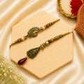 Antique Peacock Bhai Bhabhi Rakhi Set
