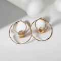 Gold stylish hoop earrings - Kashika JewelCrafts