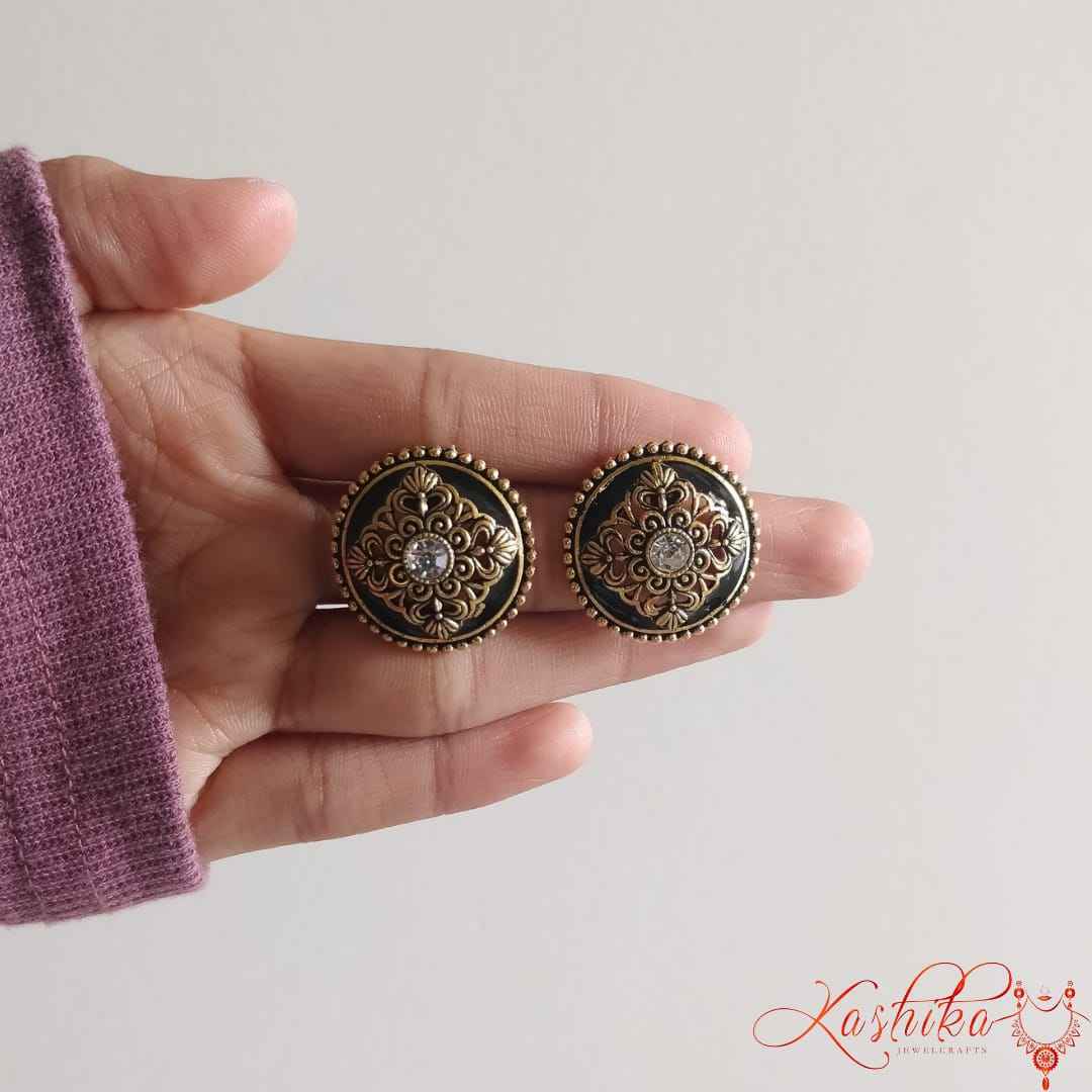 Round stud earrings with intricate gold-tone floral detailing - Kashika JewelCrafts