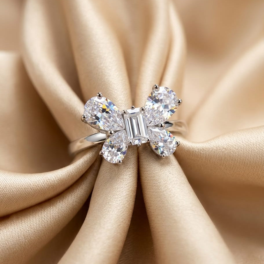 Diamond ring on beige satin fabric