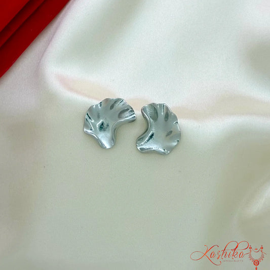 Abstract irregular silver stud earrings for women with modern minimalist design